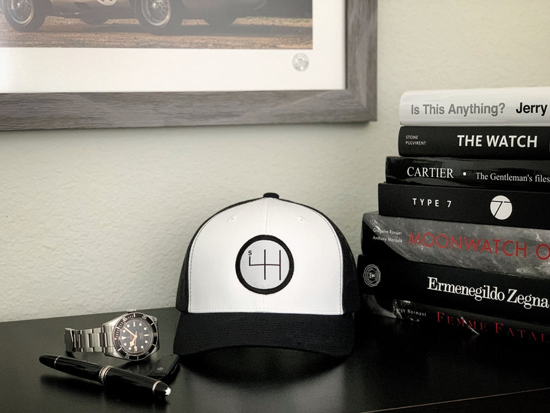 STANDARD H Garage Collection Shift Logo Trucker Hat White Black Automotive Car Enthusiast Cap Bookcase Books Shelf Mont Blanc James Brand Knife Type 7 Porsche Tudor Black Bay Watch
